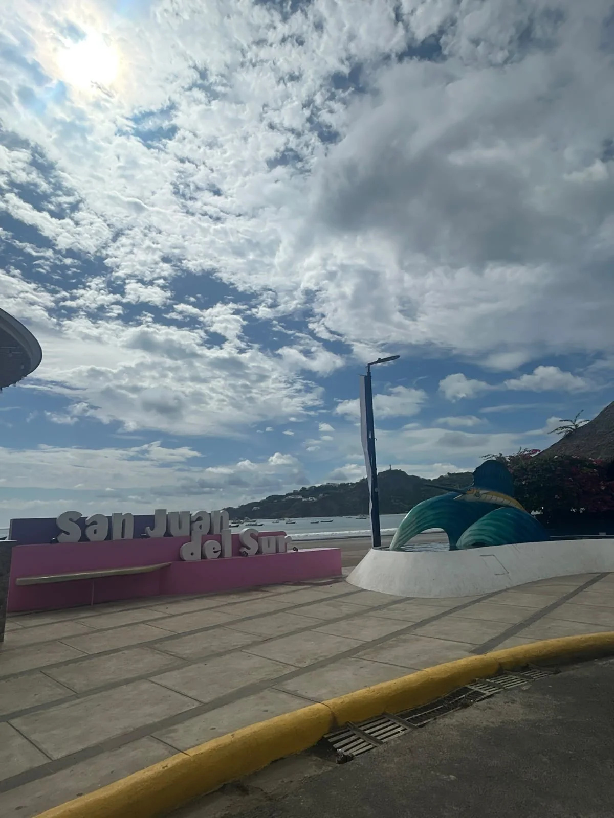 The San Juan del Sur sign and marlin statue by the bay, Nicaragua